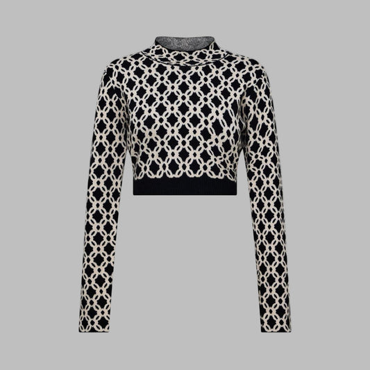 Black and white patterned top on a light gray background 1080