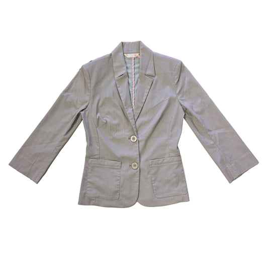 Light gray jacket on a tiled floor 2736