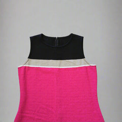 Black and pink sleeveless dress on a tiled floor
