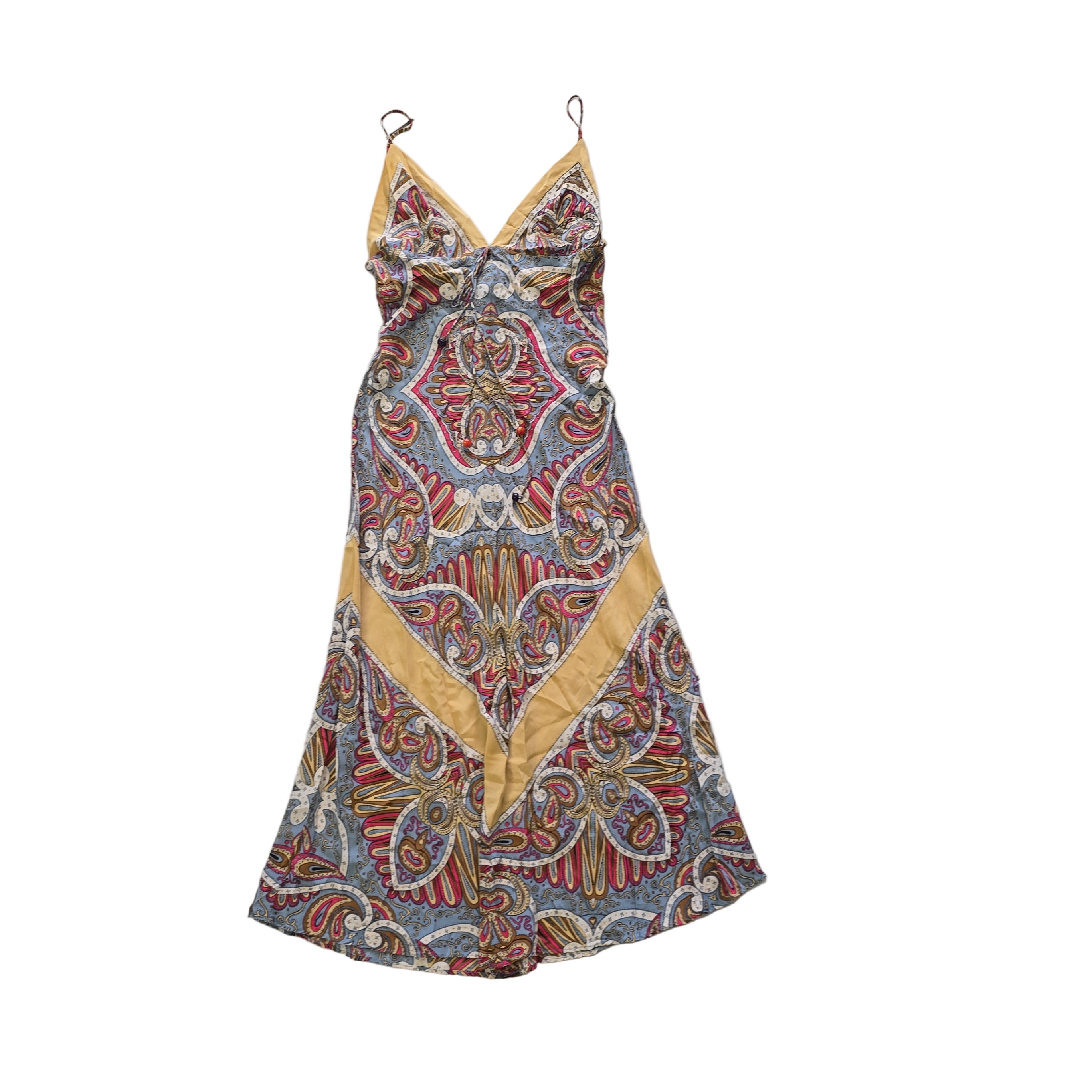 Decorative dress with paisley pattern on a tiled floor
