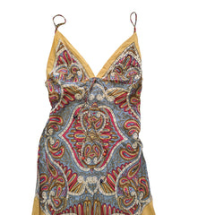 Decorative dress with paisley pattern on a tiled floor