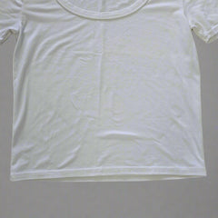 White t-shirt on a tiled floor